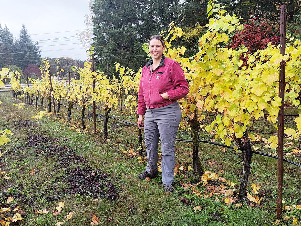 Sydni Nicolici of BBG Real Estate Services visits a client’s vineyard in Dundee, Ore. Nicolici is BBG’s director of agricultural valuation for the West Coast.